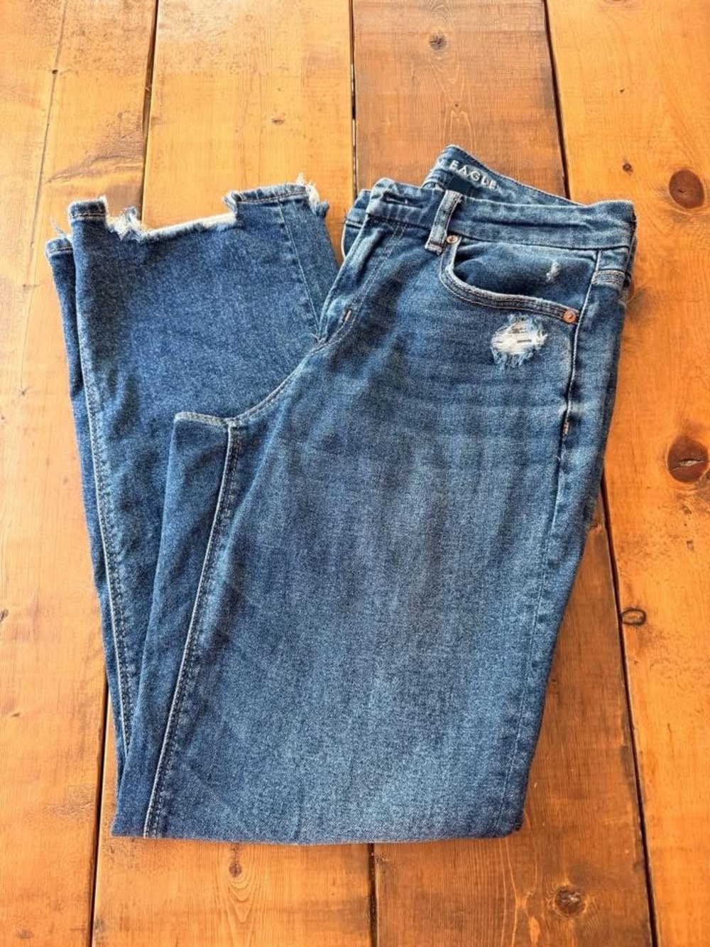 American Eagle Outfitters Curvy High-Rise Raw Hem Distressed Blue Jeans